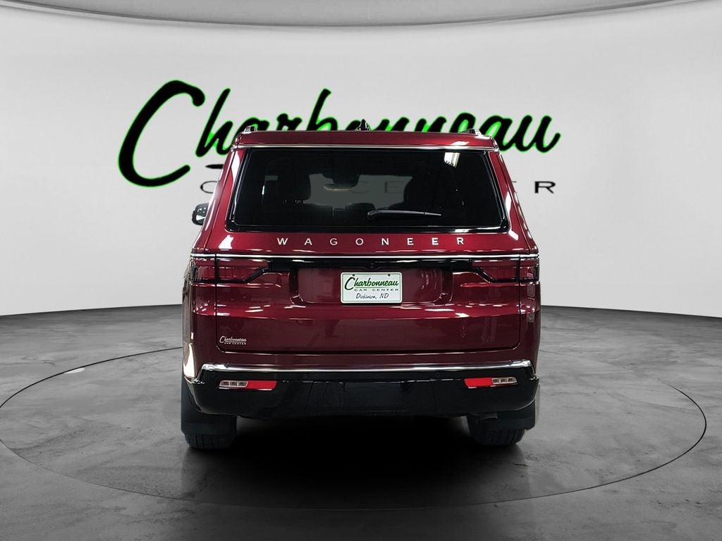 Used 2025 Velvet Red Pearlcoat Jeep Series III 4x4 image 4