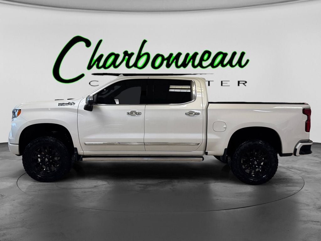 Used 2023 Iridescent Pearl Tricoat Chevrolet 4WD Crew Cab Short Bed High Country image 2