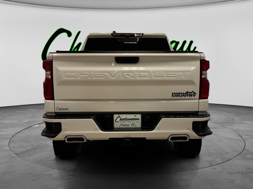 Used 2023 Iridescent Pearl Tricoat Chevrolet 4WD Crew Cab Short Bed High Country image 4