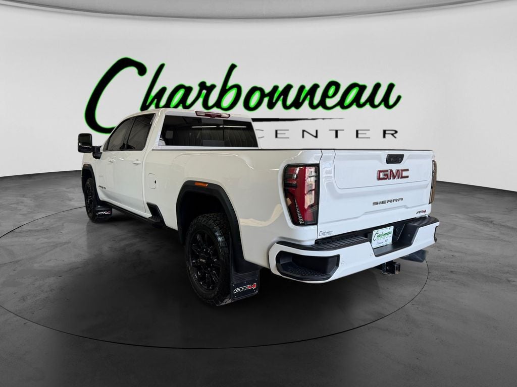 Used 2024 Summit White GMC 4WD Crew Cab Long Bed AT4 image 3