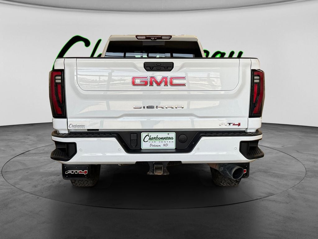 Used 2024 Summit White GMC 4WD Crew Cab Long Bed AT4 image 4