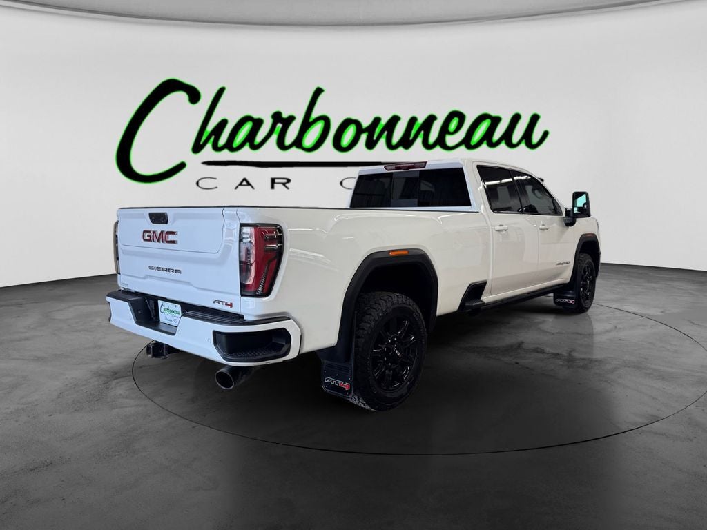 Used 2024 Summit White GMC 4WD Crew Cab Long Bed AT4 image 5