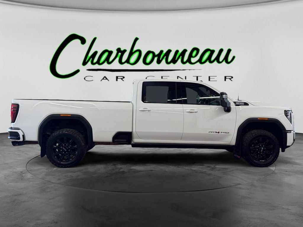 Used 2024 Summit White GMC 4WD Crew Cab Long Bed AT4 image 6