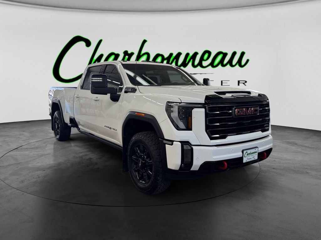Used 2024 Summit White GMC 4WD Crew Cab Long Bed AT4 image 7