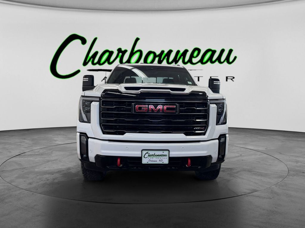 Used 2024 Summit White GMC 4WD Crew Cab Long Bed AT4 image 8