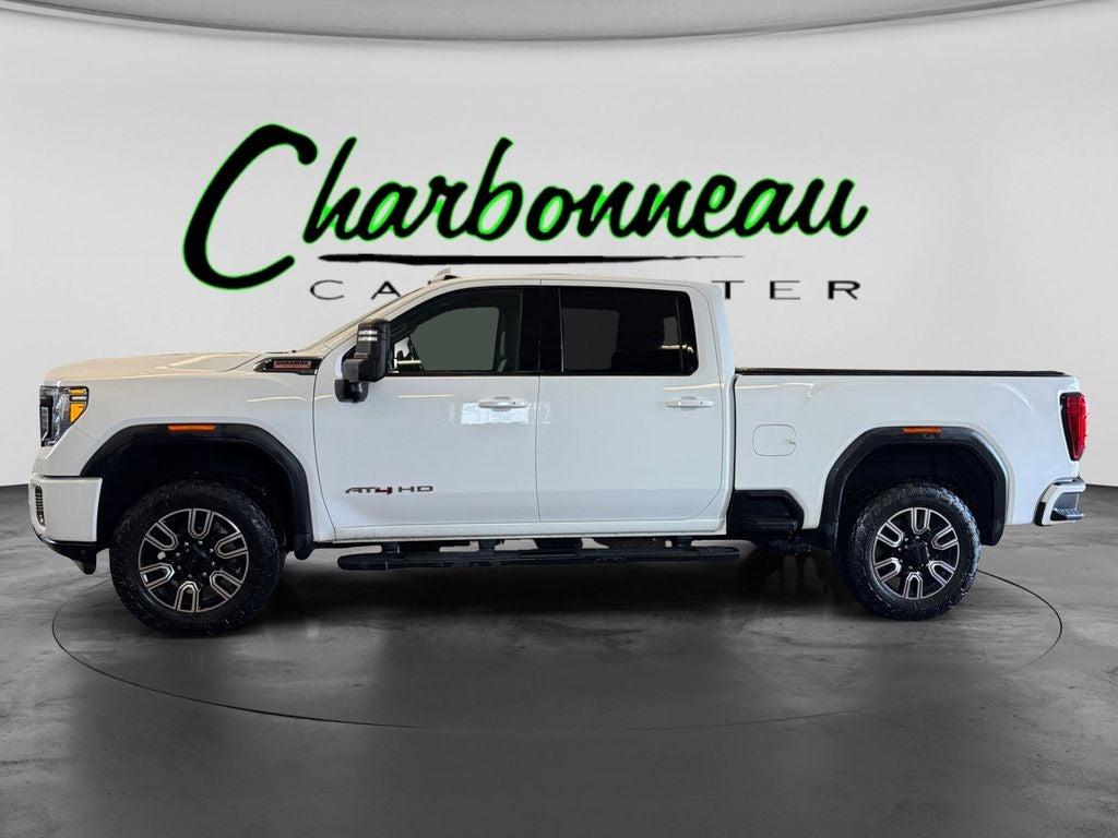 Used 2020 Summit White GMC 4WD Crew Cab Standard Bed AT4 image 2