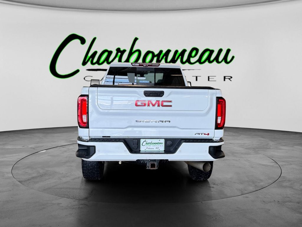 Used 2020 Summit White GMC 4WD Crew Cab Standard Bed AT4 image 4