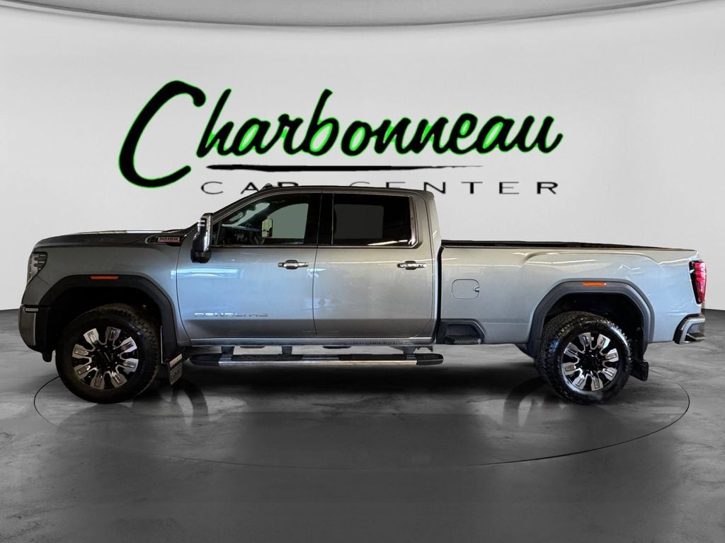 Used 2024 Sterling Metallic GMC 4WD Crew Cab Long Bed Denali image 2
