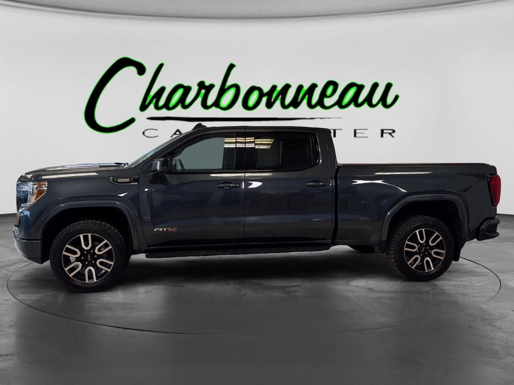 Used 2021 Dark Sky Metallic GMC 4WD Crew Cab Standard Box AT4 image 2