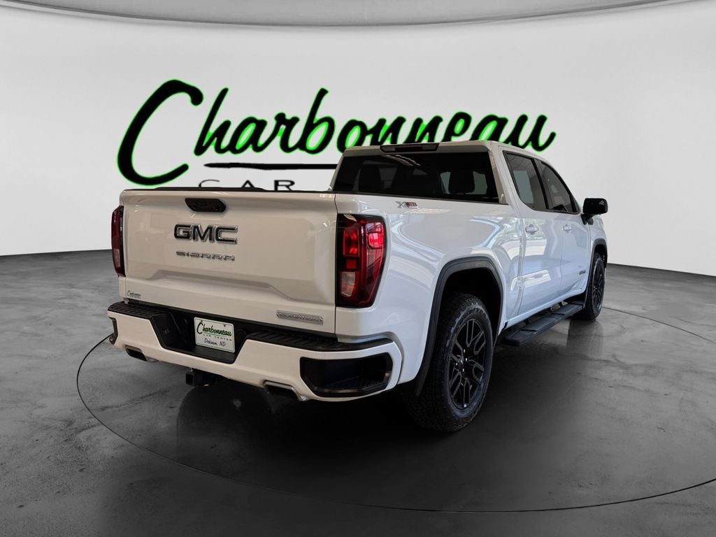 Used 2023 Summit White GMC 4WD Crew Cab Short Box Elevation with 3SB image 5