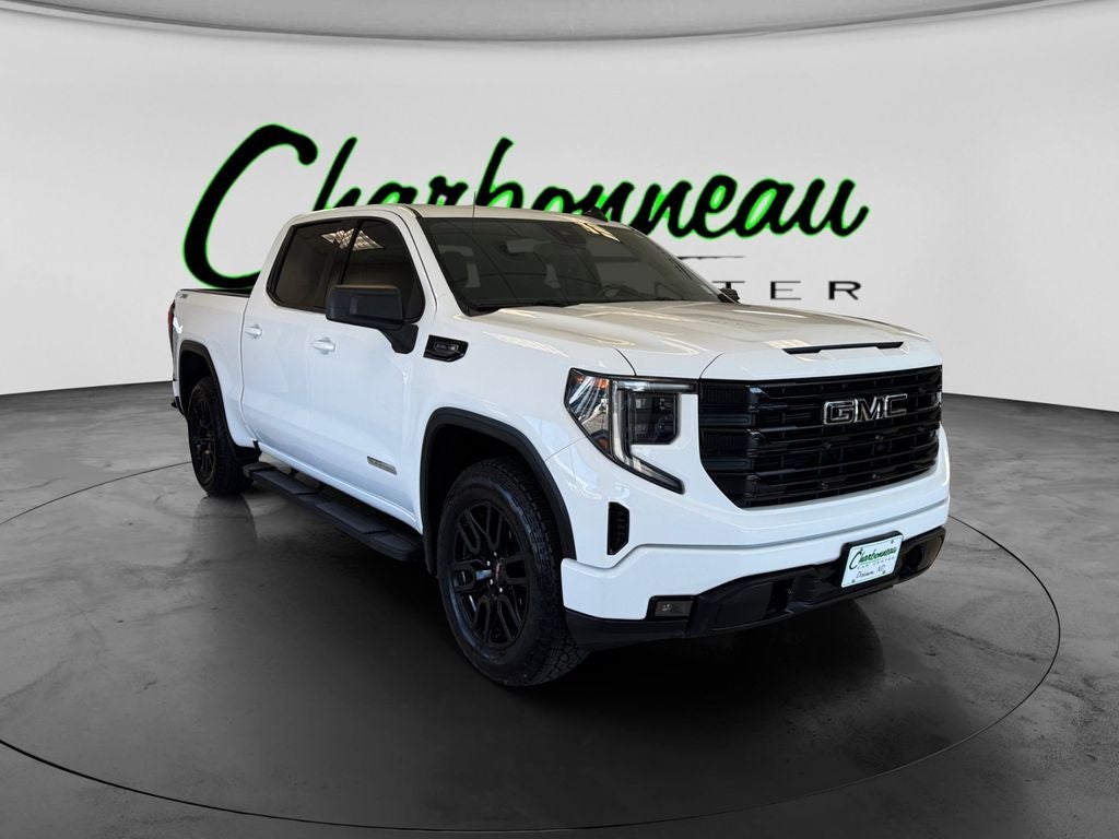 Used 2023 Summit White GMC 4WD Crew Cab Short Box Elevation with 3SB image 7