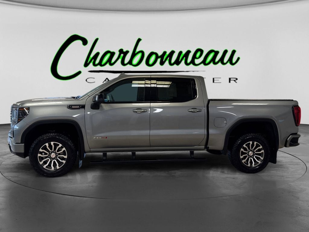 Used 2023 Sterling Metallic GMC 4WD Crew Cab Short Box AT4 image 2