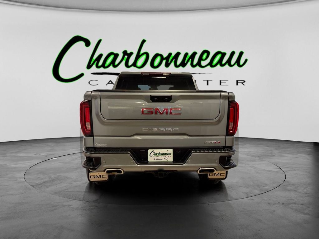 Used 2023 Sterling Metallic GMC 4WD Crew Cab Short Box AT4 image 4