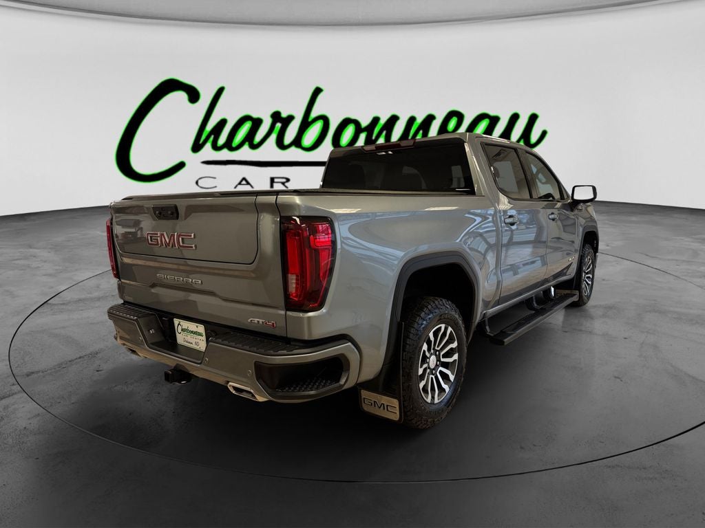 Used 2023 Sterling Metallic GMC 4WD Crew Cab Short Box AT4 image 5