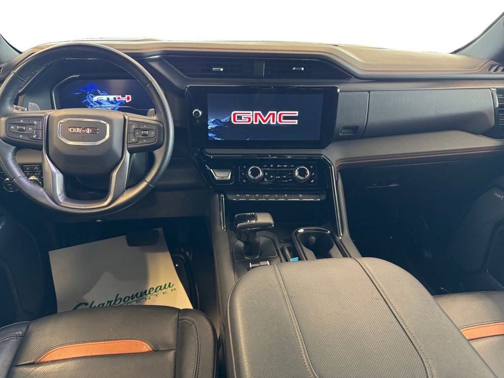 Used 2024 Onyx Black GMC 4WD Crew Cab Short Box AT4 image 12