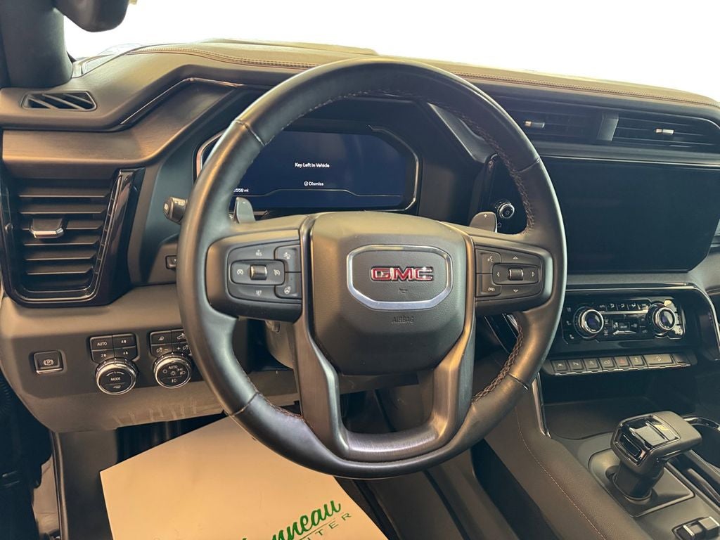 Used 2024 Onyx Black GMC 4WD Crew Cab Short Box AT4 image 13