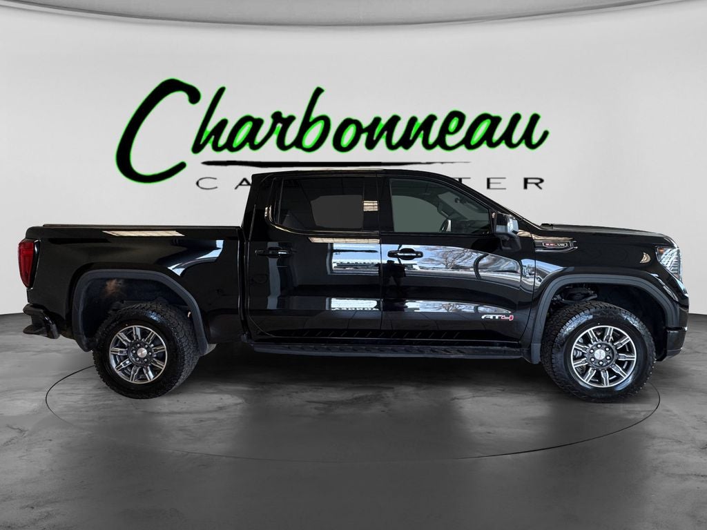 Used 2024 Onyx Black GMC 4WD Crew Cab Short Box AT4 image 6