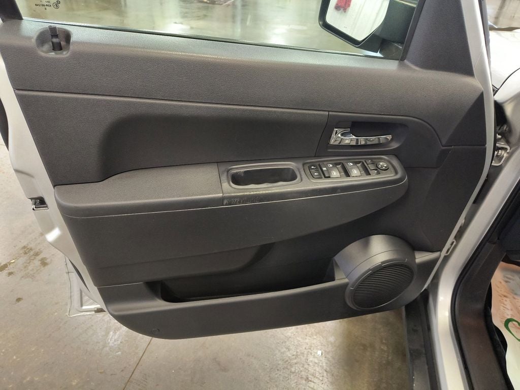 Used 2009 Bright Silver Metallic Clearcoat Jeep Sport image 11