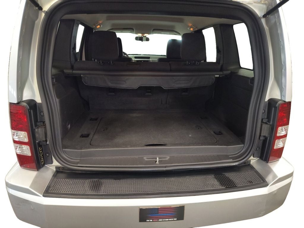 Used 2009 Bright Silver Metallic Clearcoat Jeep Sport image 19