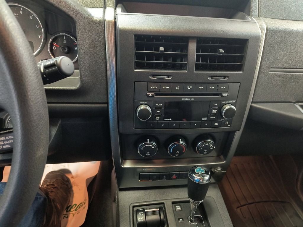 Used 2009 Bright Silver Metallic Clearcoat Jeep Sport image 21