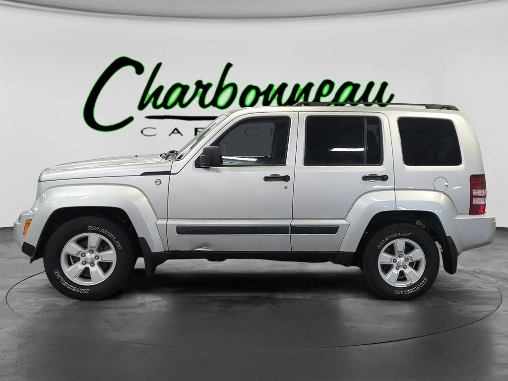 Used 2009 Bright Silver Metallic Clearcoat Jeep Sport image 2