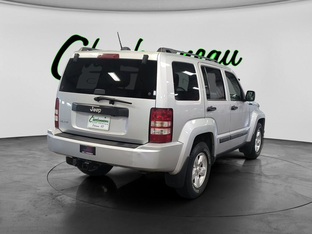 Used 2009 Bright Silver Metallic Clearcoat Jeep Sport image 5