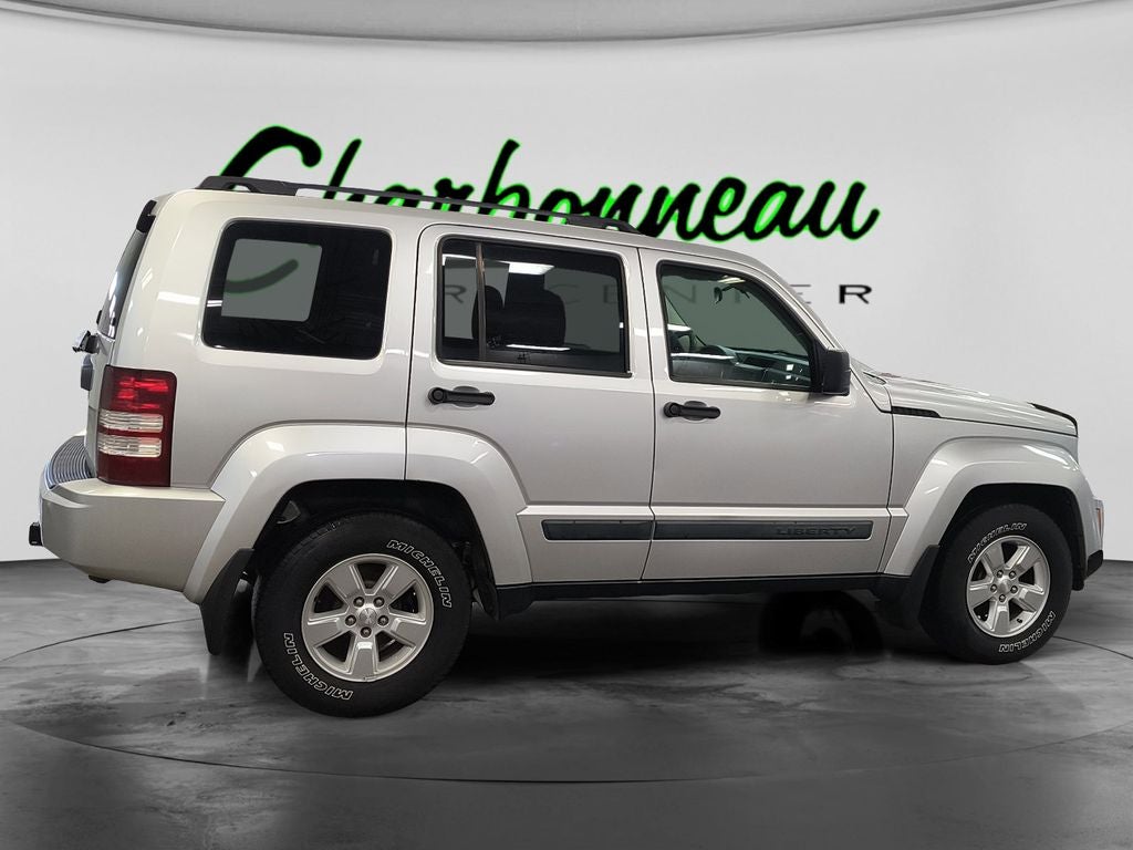 Used 2009 Bright Silver Metallic Clearcoat Jeep Sport image 6