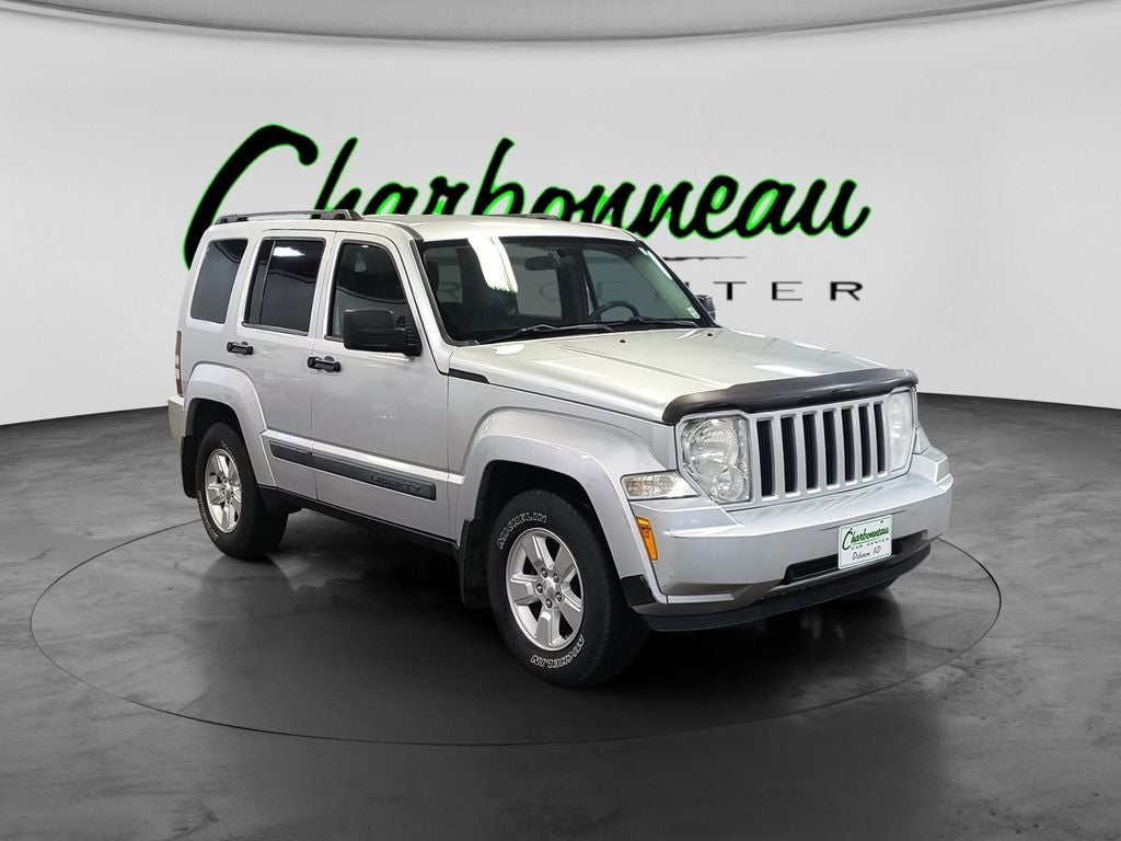 Used 2009 Bright Silver Metallic Clearcoat Jeep Sport image 7