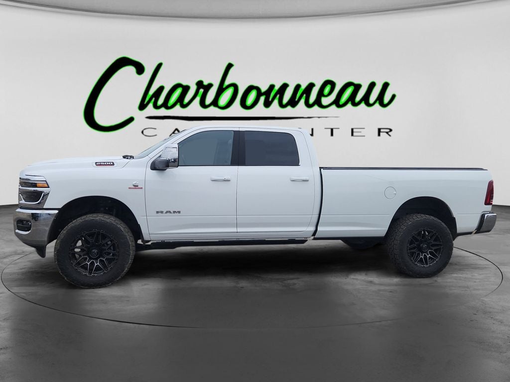 Used 2025 Bright White Clearcoat RAM Laramie Crew Cab 4x4 8