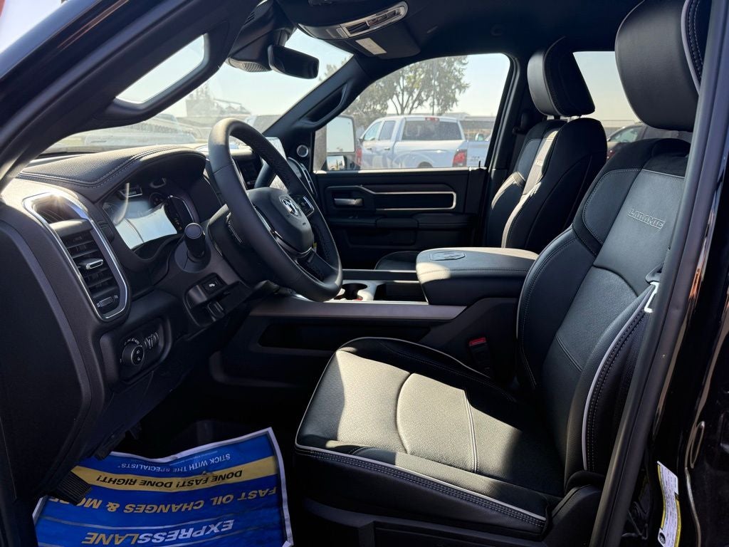 Used 2025 Diamond Black Crystal Pearlcoat RAM Laramie Crew Cab 4x4 8