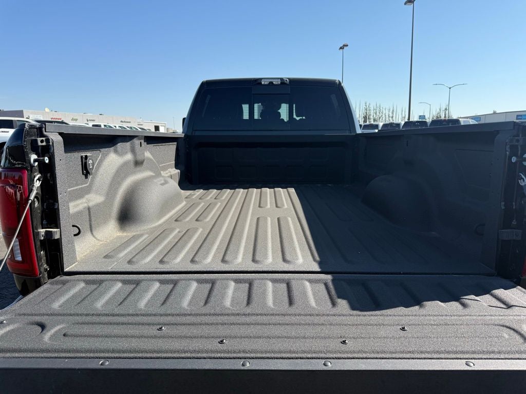 Used 2025 Diamond Black Crystal Pearlcoat RAM Laramie Crew Cab 4x4 8