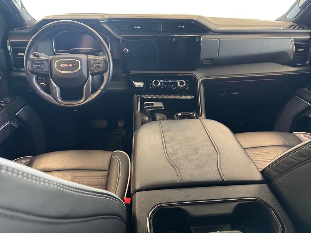 Used 2024 Sterling Metallic GMC 4WD Crew Cab Short Box AT4X image 12