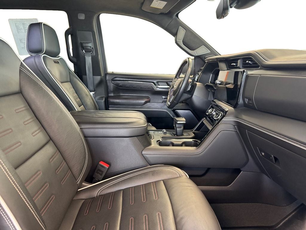 Used 2024 Sterling Metallic GMC 4WD Crew Cab Short Box AT4X image 17