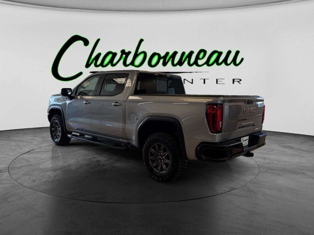 Used 2024 Sterling Metallic GMC 4WD Crew Cab Short Box AT4X image 3