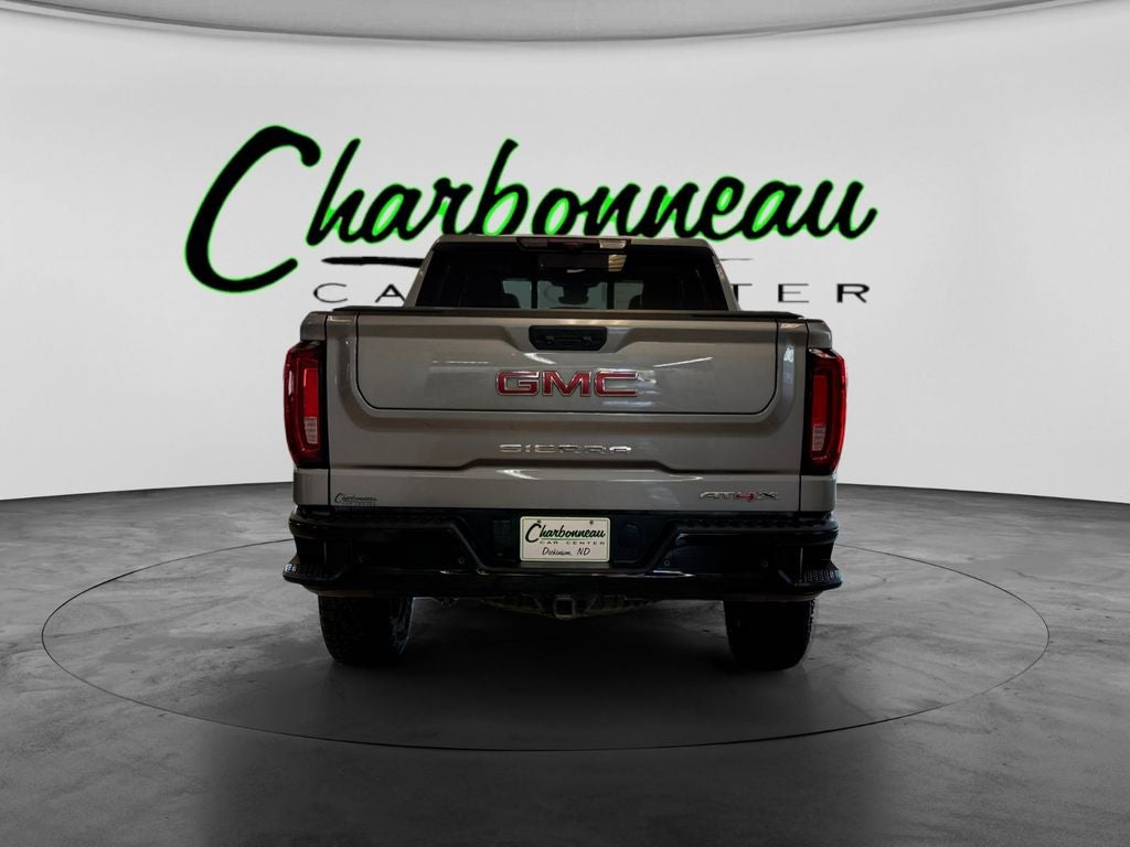 Used 2024 Sterling Metallic GMC 4WD Crew Cab Short Box AT4X image 4