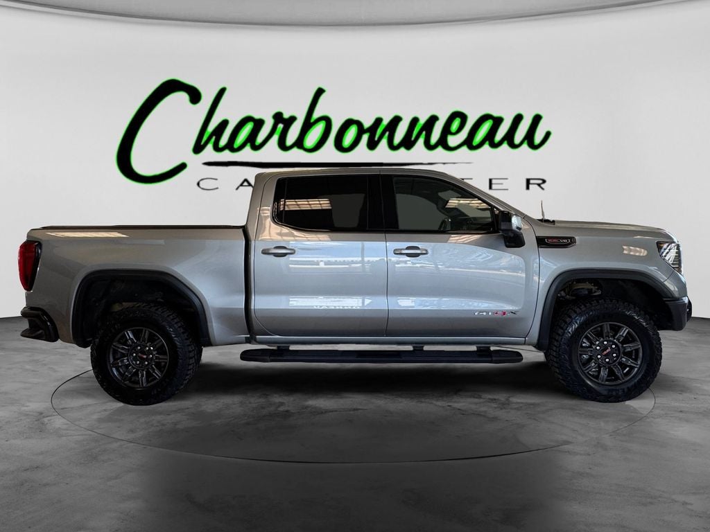 Used 2024 Sterling Metallic GMC 4WD Crew Cab Short Box AT4X image 6