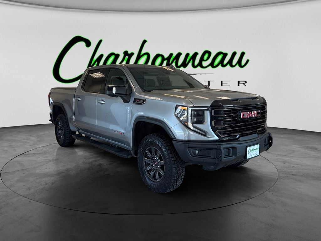 Used 2024 Sterling Metallic GMC 4WD Crew Cab Short Box AT4X image 7