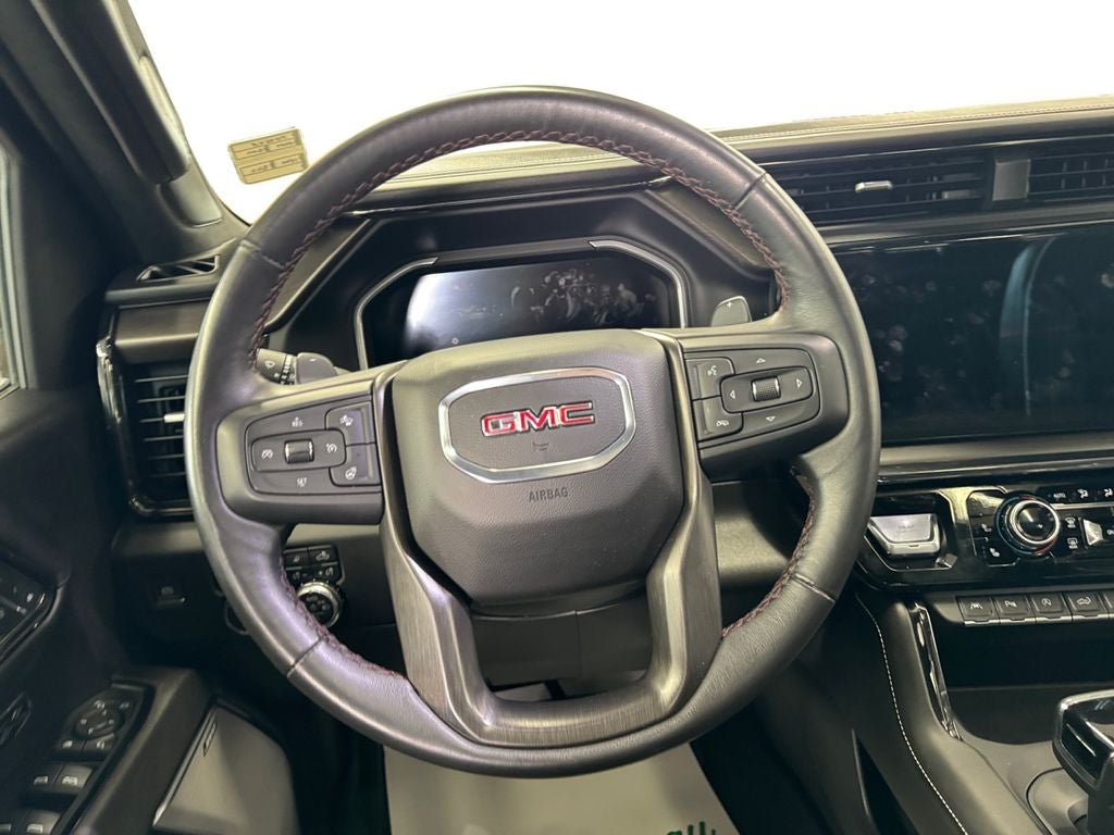 Used 2024 Dynamic Blue Metallic GMC 4WD Crew Cab Short Box AT4X image 13
