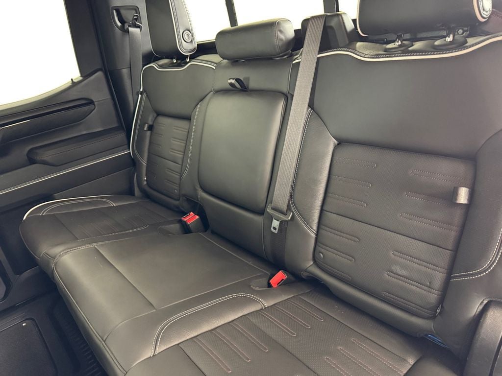 Used 2024 Dynamic Blue Metallic GMC 4WD Crew Cab Short Box AT4X image 16