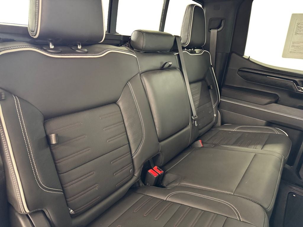 Used 2024 Dynamic Blue Metallic GMC 4WD Crew Cab Short Box AT4X image 18