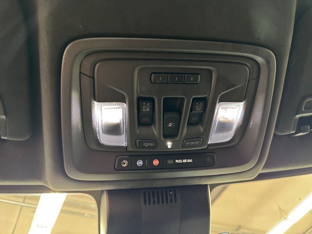 Used 2024 Dynamic Blue Metallic GMC 4WD Crew Cab Short Box AT4X image 22