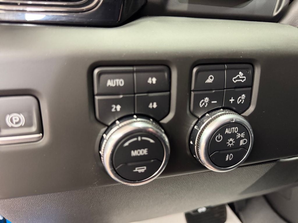 Used 2024 Dynamic Blue Metallic GMC 4WD Crew Cab Short Box AT4X image 23