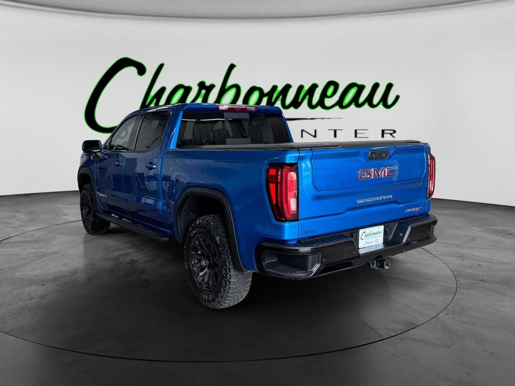 Used 2024 Dynamic Blue Metallic GMC 4WD Crew Cab Short Box AT4X image 3