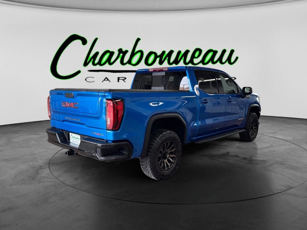 Used 2024 Dynamic Blue Metallic GMC 4WD Crew Cab Short Box AT4X image 5