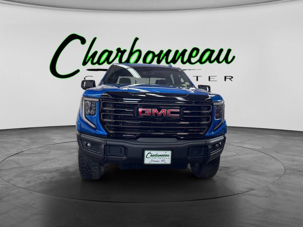 Used 2024 Dynamic Blue Metallic GMC 4WD Crew Cab Short Box AT4X image 8