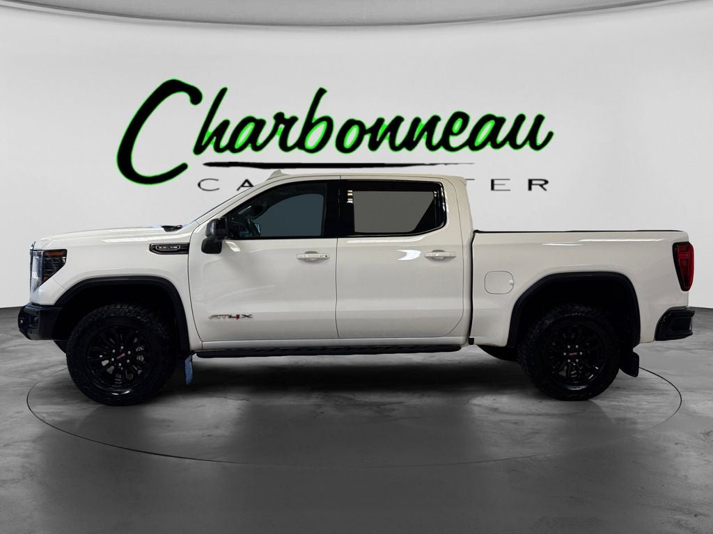 Used 2023 Summit White GMC 4WD Crew Cab Short Box AT4X image 2