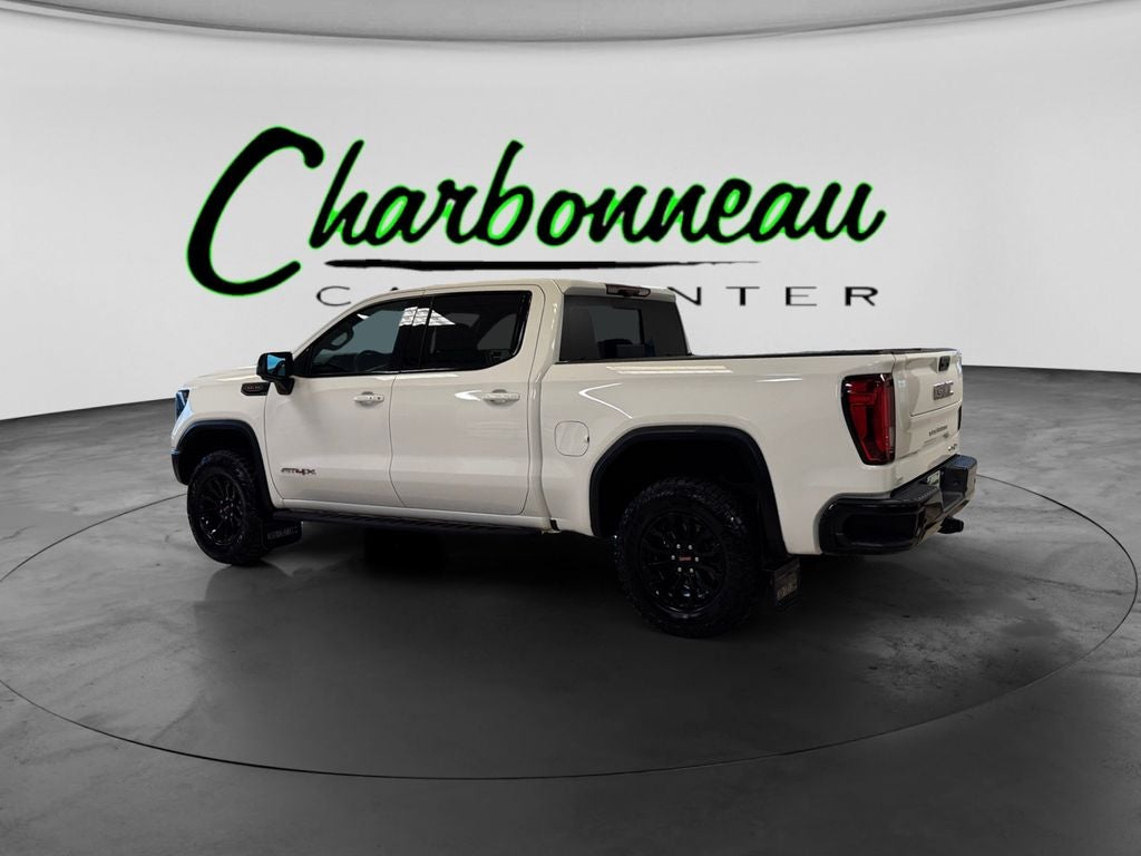 Used 2023 Summit White GMC 4WD Crew Cab Short Box AT4X image 3