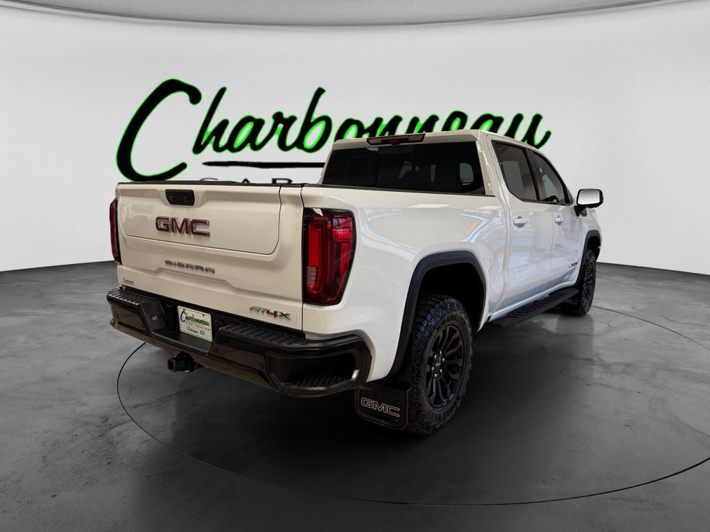 Used 2023 Summit White GMC 4WD Crew Cab Short Box AT4X image 5