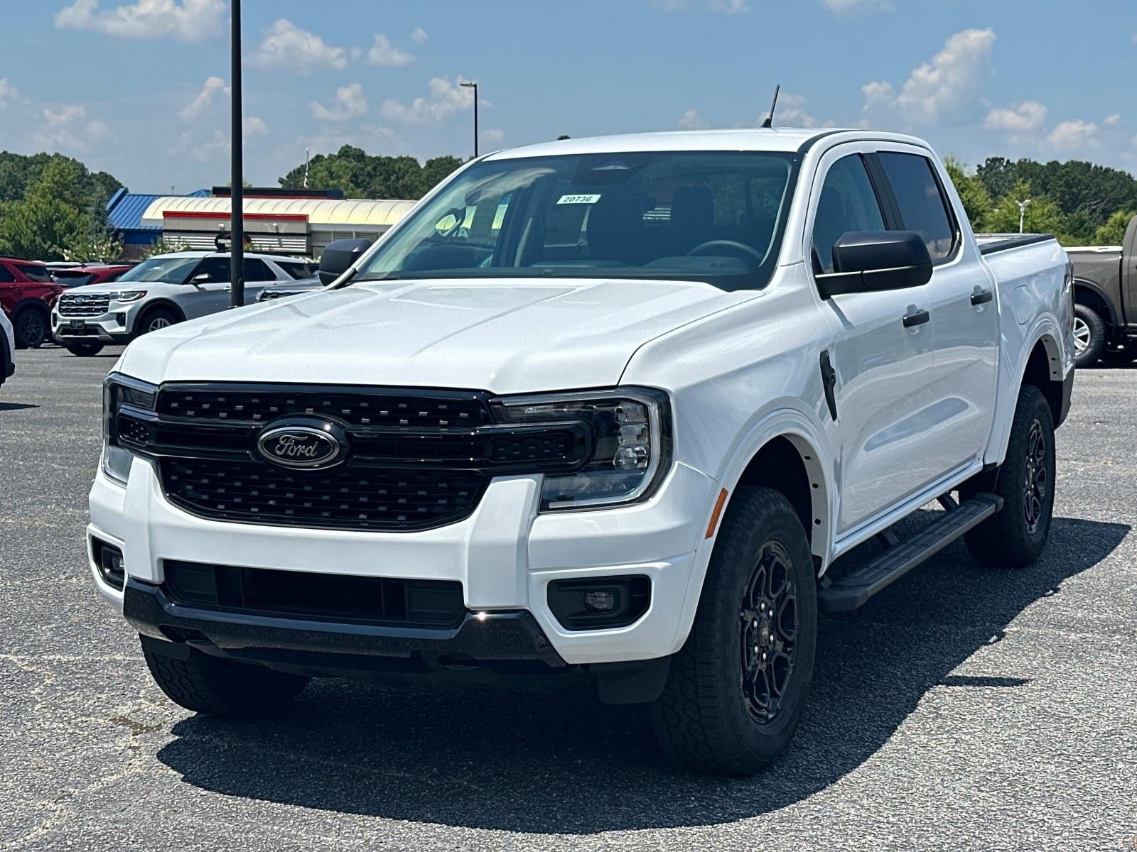 View vehicle photo 3