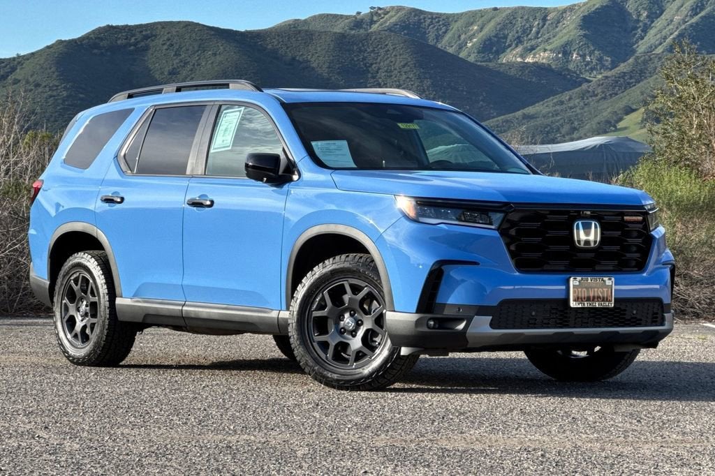 View vehicle photo 2